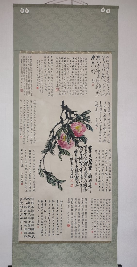 A vertical scroll of Wu Changshuo Shou Tao on paper (1 of 6)