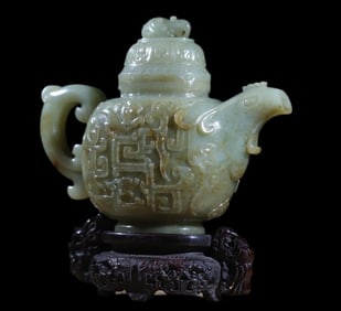 A dragon and phoenix jade pot ornament