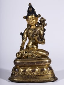 A seated bronze gilt statue of Tara from the Qing Dynasty