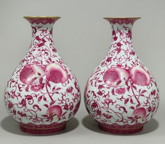 A pair of Yongzheng year of the Qing Dynasty made pink carmine entwined branch lotus three-fruit