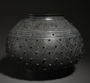 An old bronze jar ornament