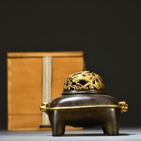 A piece of clear copper gilt animal ear diffuser lid furnace