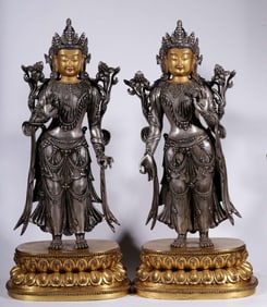 A pair of silver-gilt statues of Guanyin from the Qing Dynasty