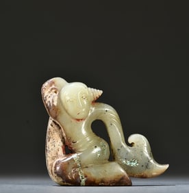 A piece of ancient jade inlaid with a carved piece of a green pine dancer