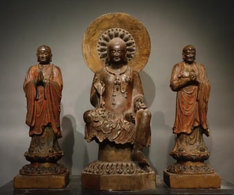 A set of bluestone carved and painted Buddha statues in the Northern Qi Dynasty