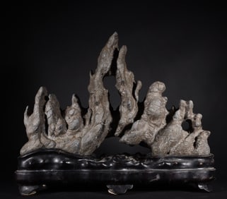 A piece of the old Tibetan mid-Qing Dynasty hump Lingbi stone hollow mountain ornament with a