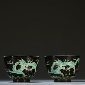 A pair of Qing Jiaqing ink ground green color dragon pattern cups