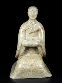 An old collection of Hetian jade kneeling people