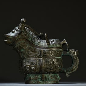 A piece of Western Zhou bronze beast-shaped sage