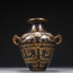 A Han bronze wrong gold and silver double beast ear vase