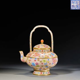 Qing Qianlong copper gilt painting enamel ball pattern handle pot