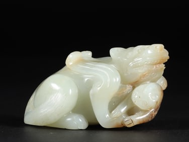 A piece of Hetian jade mother beast ornament