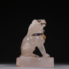 A crystal-encrusted silver lion ornament