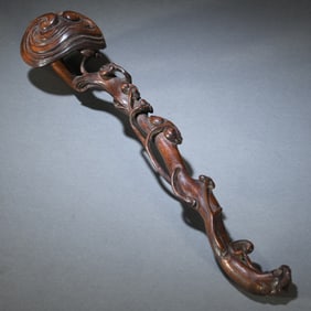 A piece of Qing agarwood carved Ganoderma lucidum Ruyi ornament
