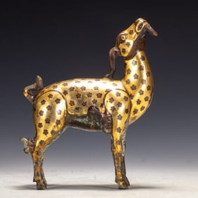 A piece of wrong gold and silver beast