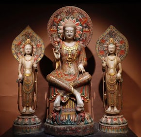 A set of white marble painted Buddha statues in the Northern Qi Dynasty