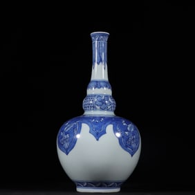 An old Tibetan Qing Dynasty blue and white gourd vase