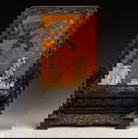 A piece of rosewood inlaid with treasure interstitials