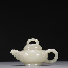 A piece of Qing Dynasty Hetian jade seed material slub pattern teapot