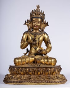 A Qing Dynasty bronze gilt turquoise Vajrasattva seated statue