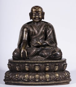 A bronze seated statue of Guru Marpa from the Qing Dynasty
