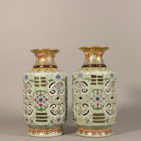 A pair of Qing Qianlong - green painted gold hollow set of bottles