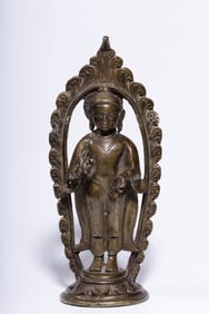 A bronze statue of the Buddha of the Great Day