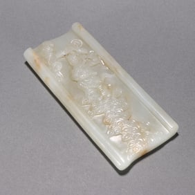 A piece of Qing Dynasty Hetian jade seed material boy offering longevity arm rest