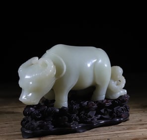 A shepherd boy white jade cow ornament