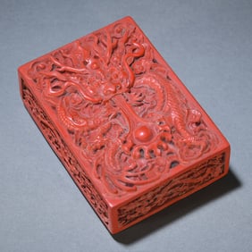 A late Qing Dynasty red lacquer carved auspicious dragon Turui square box