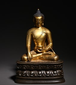 An old Tibetan bronze gilt Sakyamuni scholar's ornament