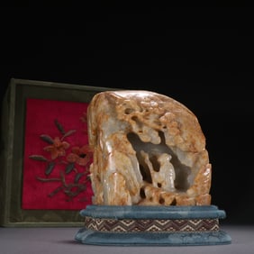 A Qing Dynasty Hetian jade seed material Panasonic character Shanzi ornament