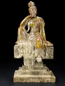 An old collection of Hetian jade seated Buddha