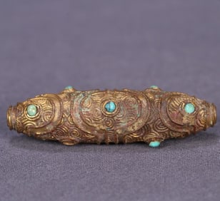 Tang copper gilt inlaid turquoise dzi