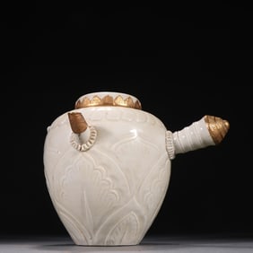 An Exquisite Song Ding kiln carved and wrapped gold boiling wine jug