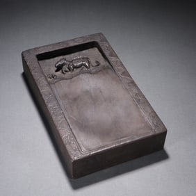 A Qing Dynasty stone carved Rui beast inkstone