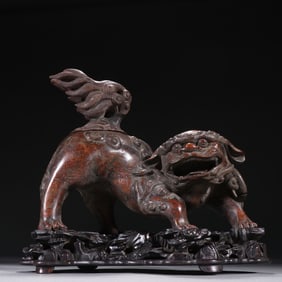 An Exquisite Qing agarwood carved lion aromatherapy ornaments