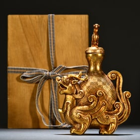 A bronze gilt phoenix button dragon pot