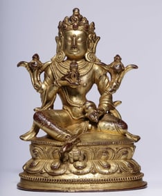 A bronze gilt Vajrasattva hammer seated statue of the Qing Dynasty