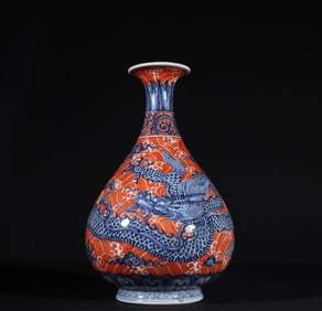 A Ming Dynasty Xuande blue and white alum red sea water cloud dragon pattern jade pot spring bottle