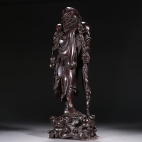 A late Qing Dynasty rosewood carved iron canopy ornament