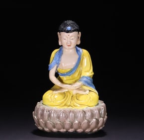 A Qing porcelain statue of Shakyamuni Buddha