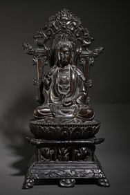 An agarwood Guanyin study ornament