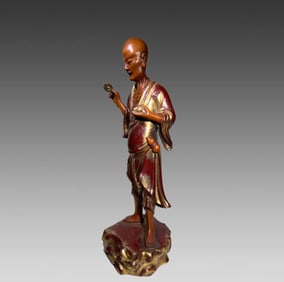 An Exquisite Qing Dynasty boxwood gold lacquer arhat