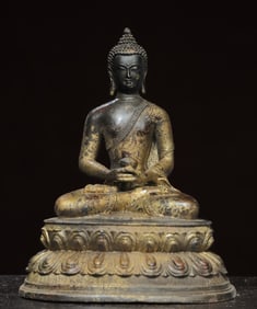 A bronze gold statue of Shakyamuni Buddha