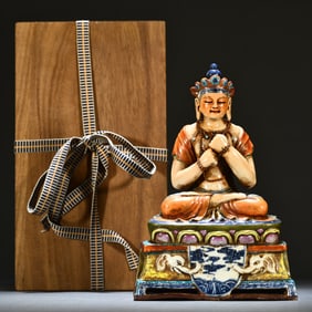 A statue of the Bodhisattva in pastel color