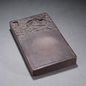 A Qing Dynasty stone carving dragon inkstone