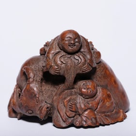 A Qing Dynasty bamboo carving boy cattle ornament
