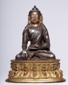 A Qing Dynasty silver-gilt immovable Buddha seated statue