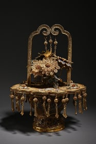 A bronze gilt inlaid treasure flower blue study ornament